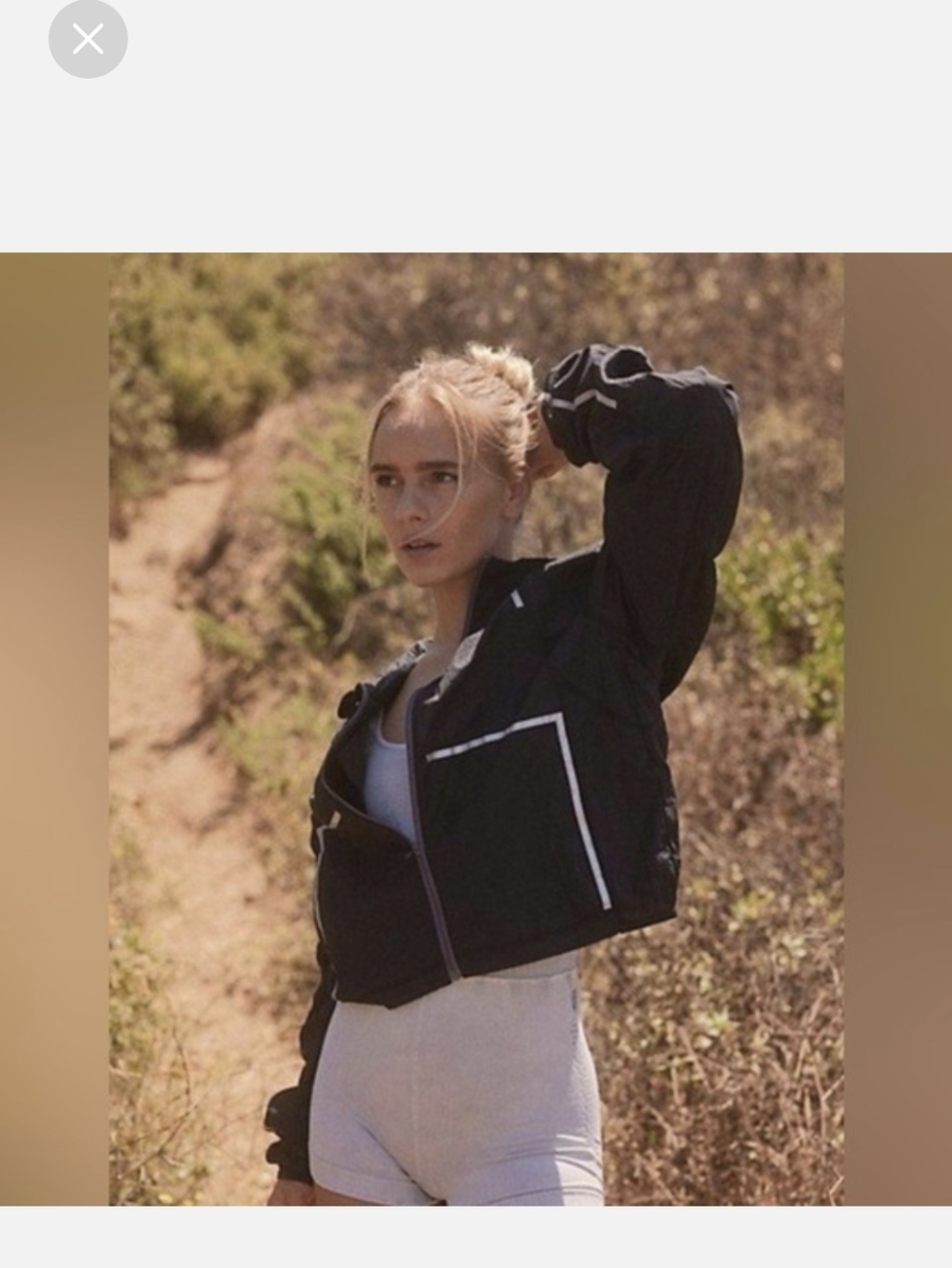 FP Movement by Free People Black Great Escape Run Windbreaker with White Trim.